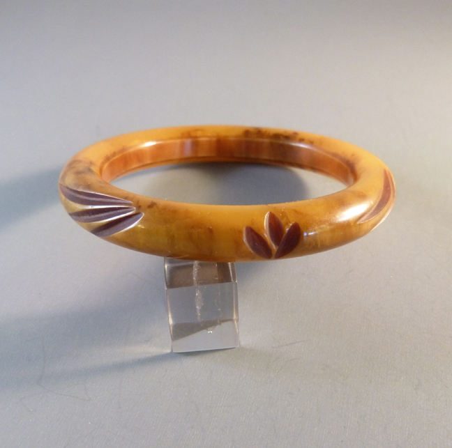 BAKELITE butterscotch tube bangle carved & with brown overdye