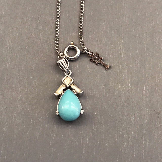TRIFARI teardrop-shaped rhinestone pendant, silver chain