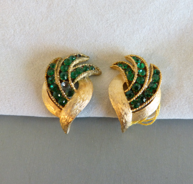 TRIFARI green rhinestones earrings set in brushed gold tone