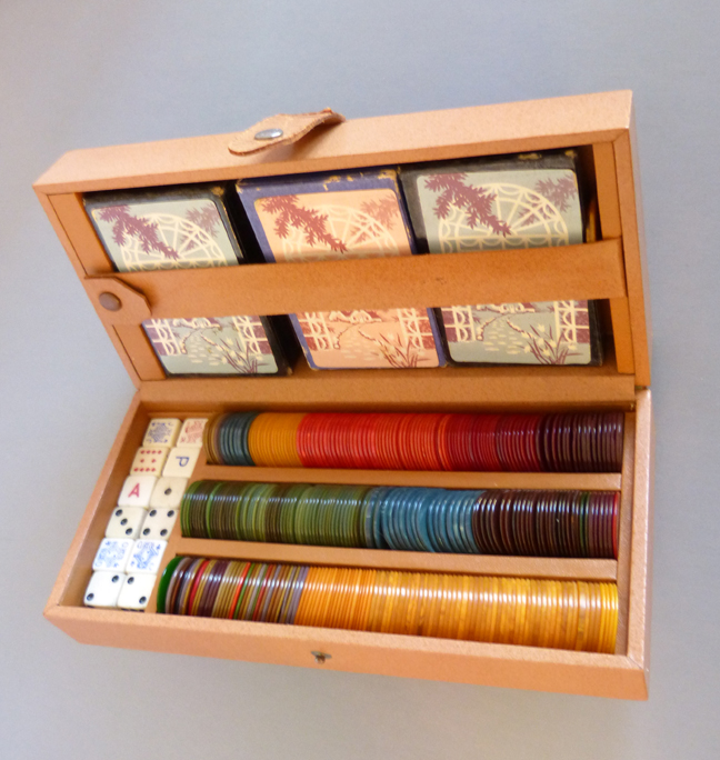 BAKELITE boxed poker chips set with three sets of old playing cards
