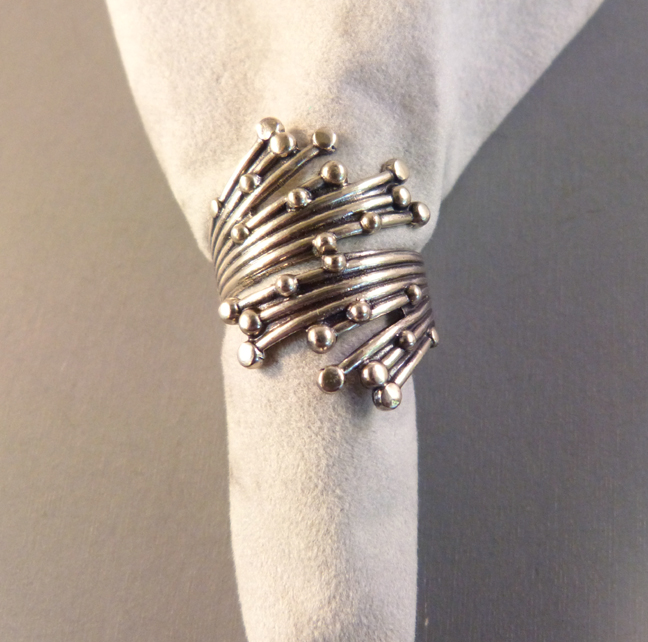 BEAU sterling ring with shooting lines, each ending with a tiny ball