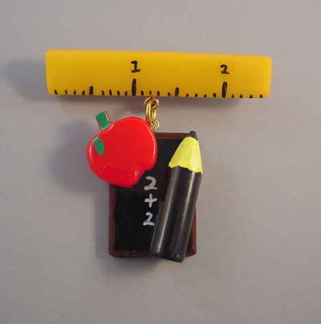 SHULTZ bakelite School Days brooch