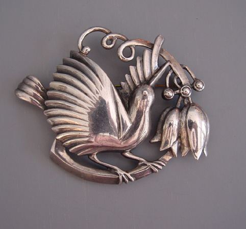 SILVER beautifully designed bird and flowers brooch