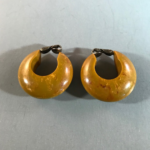 BAKELITE earrings in a lightly marbled olive green color