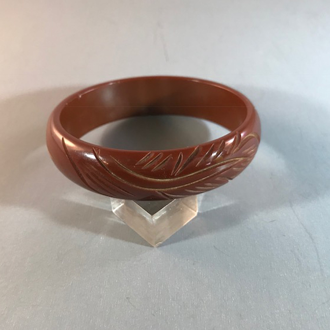 BAKELITE brown maiden size carved bangle, 2-1/4″