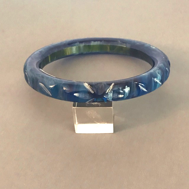 BAKELITE carved bangle in blue moon with black marbling