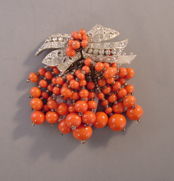 MIRIAM HASKELL Hess bow dress clip, orange glass beads