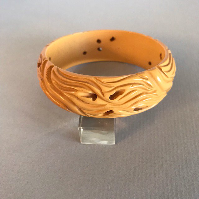BAKELITE butterscotch worm carved and pierced bangle
