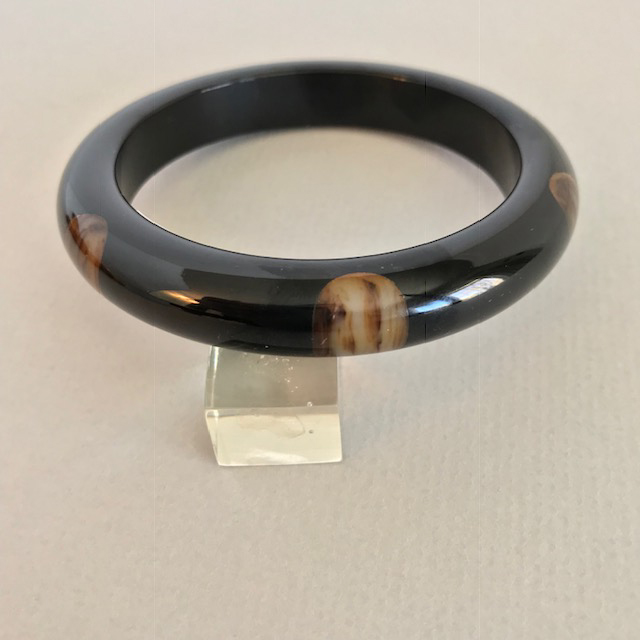 BAKELITE black bangle with six marbled brown dots