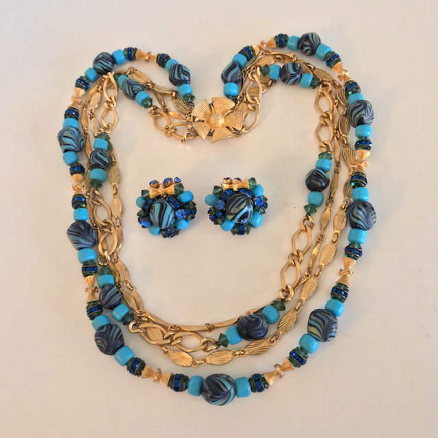HATTIE CARNEGIE aqua and dark blue glass peacock swirl bead necklace and clip back earrings