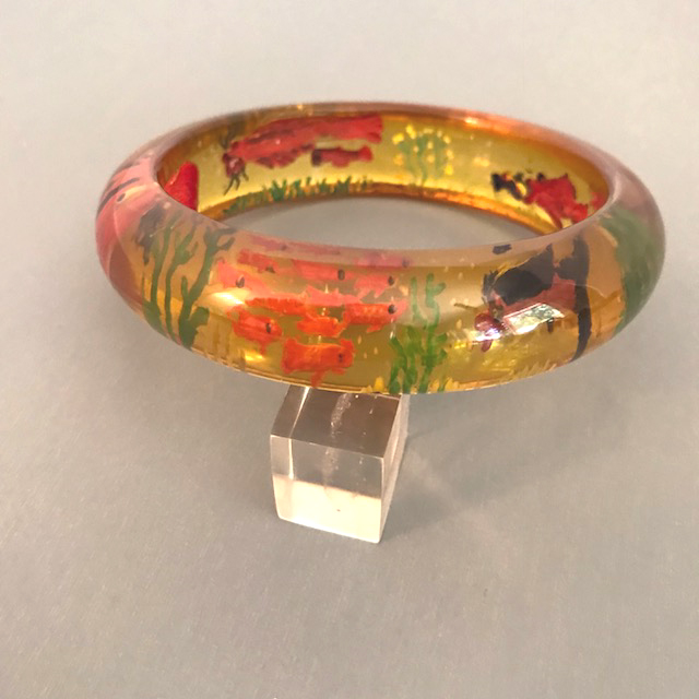 JUDY CLARKE bakelite apple juice bangle reverse carved & painted sea life designs