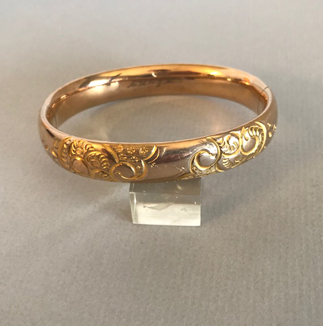 DB&Co yellow gold filled hinged puffy bangle with embossed scrolls