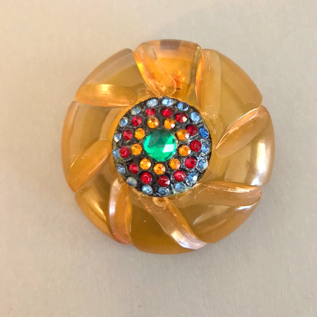 BAKELITE apple juice dress clip with colorful red, green, blue and yellow rhinestones