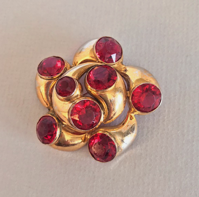 CHERRY RED rhinestones brooch set into swirling cornucopia shapes