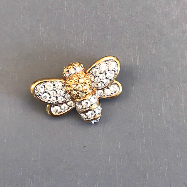 SWAROVSKI bee pin in clear and jonquil colored rhinestones