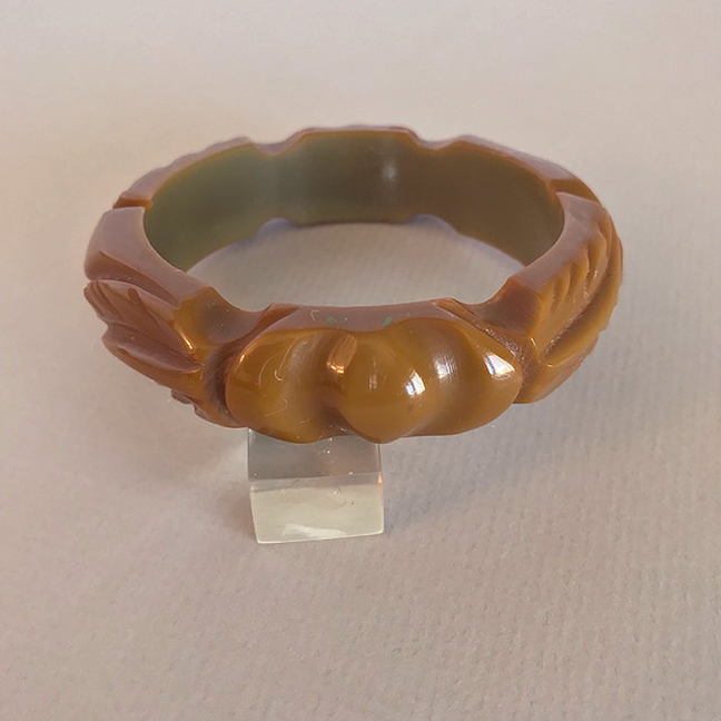 BAKELITE khaki green bangle carved with knot and leaves