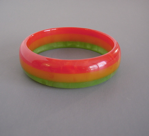 DOMBEK bakelite three row laminated bangle in red, peach and green