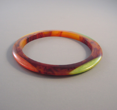 SHULTZ bakelite slice spacer bangle in marbled tortoise colored with 4 dots