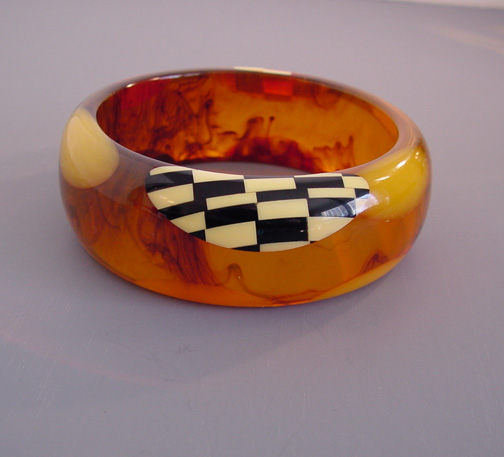 SHULTZ bakelite marbled tortoise colored bangle with checked dots