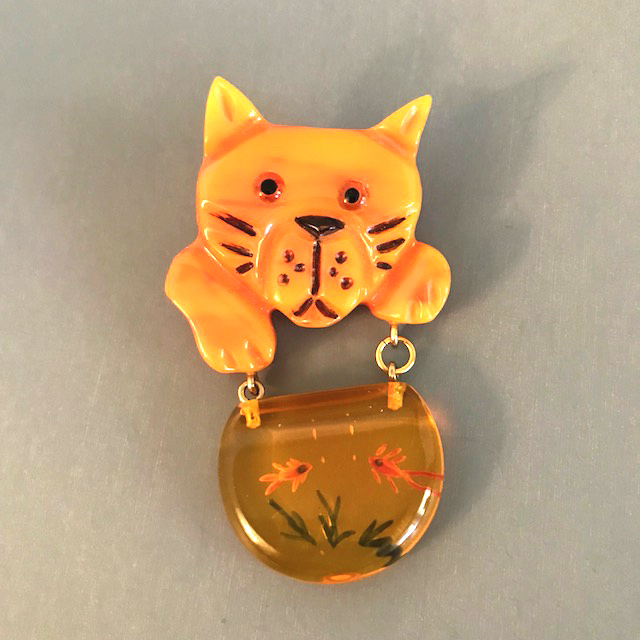 SHULTZ bakelite hand carved cat brooch with dangling fish bowl