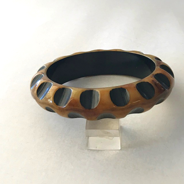 BAKELITE butterscotch bangle with a rust over-dye and black gouge ...