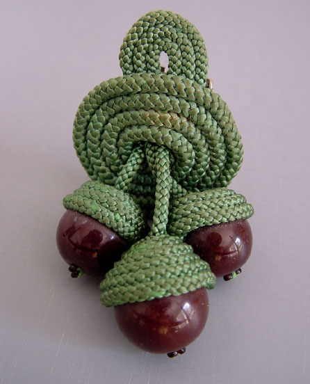 MIRIAM HASKELL acorn dress clip with brown glass beads and seed beads and green cord