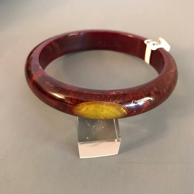SHULTZ bakelite burgundy moon bangle with yellow marbled dots