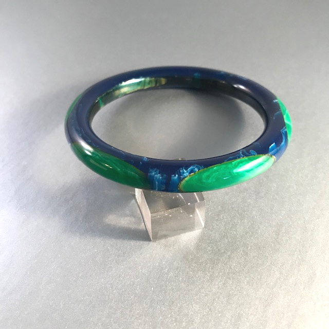 SHULTZ bakelite blue marbled tube bangle with six green oval dots