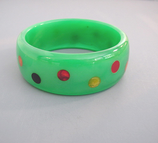 SHULTZ bakelite green slightly marbled and translucent bangle with multi-colored confetti dots