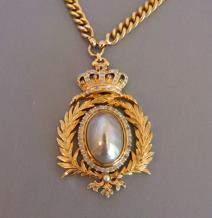 NETTIE ROSENSTEIN heraldic regal pendant with a crown and wreath circa 1965