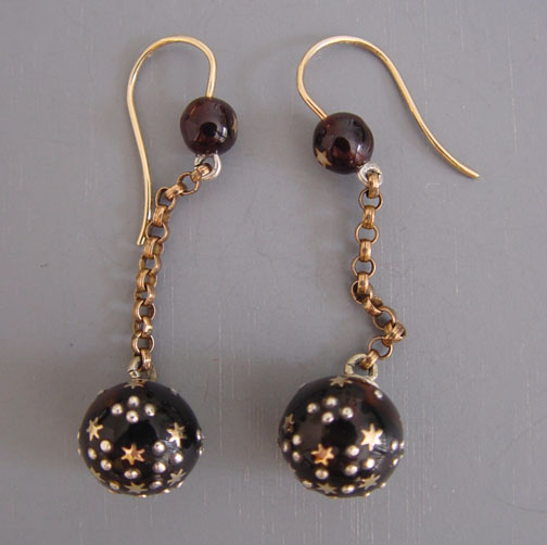 VICTORIAN tortoise pique point earrings with dangling balls at either end of gold chains circa 1880