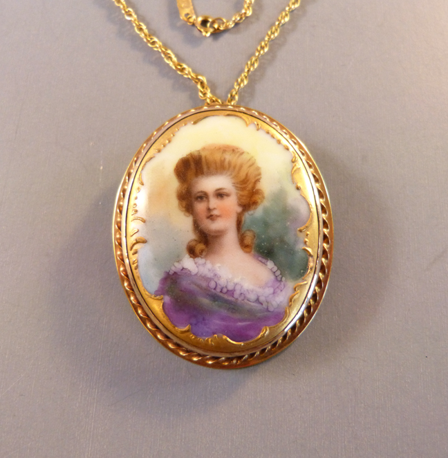 VICTORIAN 10-14 karat yellow gold and hand painted portrait brooch with a pop-up loop for a necklace chain