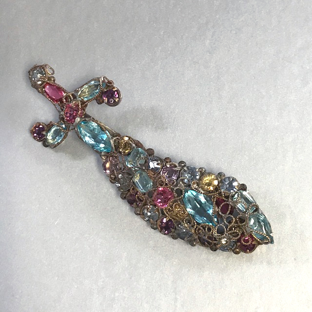 Robert or Hobe unsigned sword pin with aqua, pink, pale yellow, purple and blue rhinestones