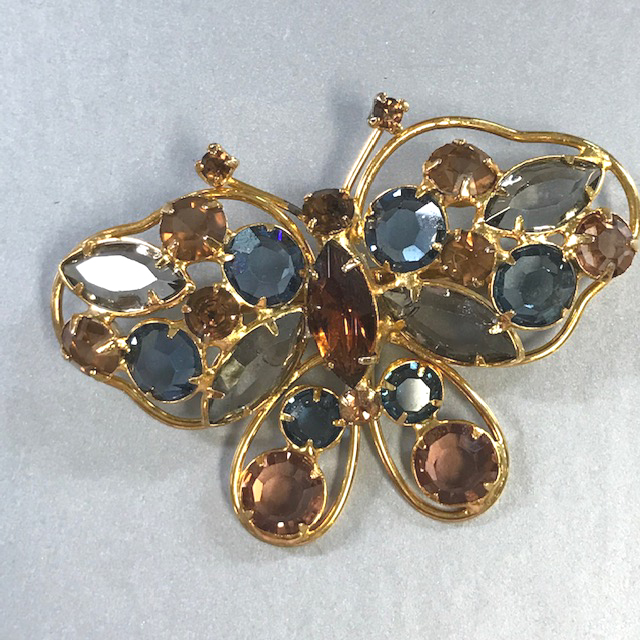 BUTTERFLY brooch with unfoiled tan, blue and gray rhinestones
