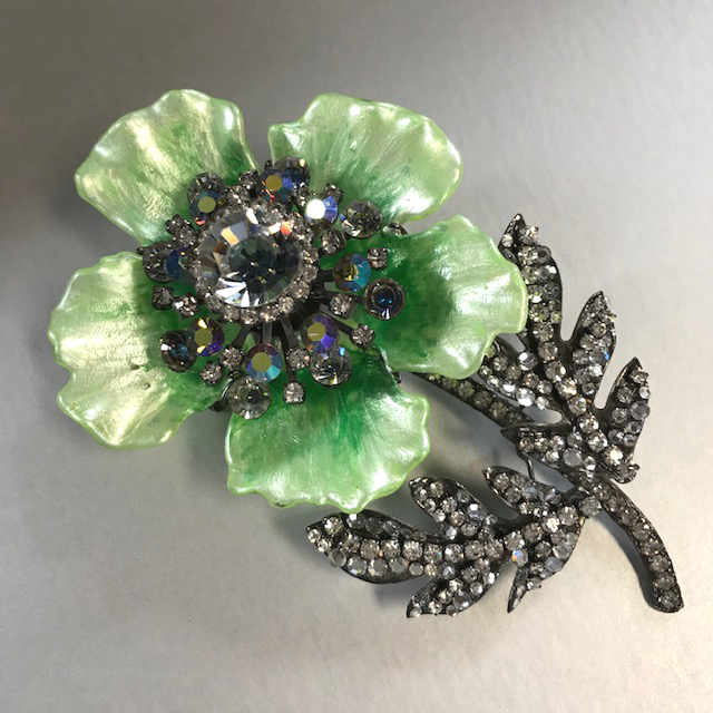 LARRY VRBA flower brooch with green frosted glass petals, gray aurora borealis rhinestone center