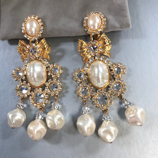 LARRY VRBA earrings with a gold tone bow top, glass pearls and clear rhinestones with three glass pearls