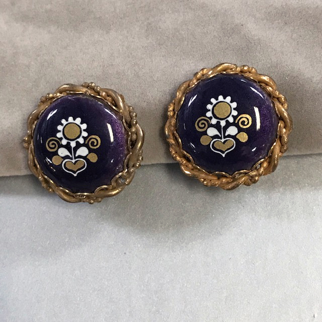 MIRIAM HASKELL dark purple earrings with a stylized flower and leaves design