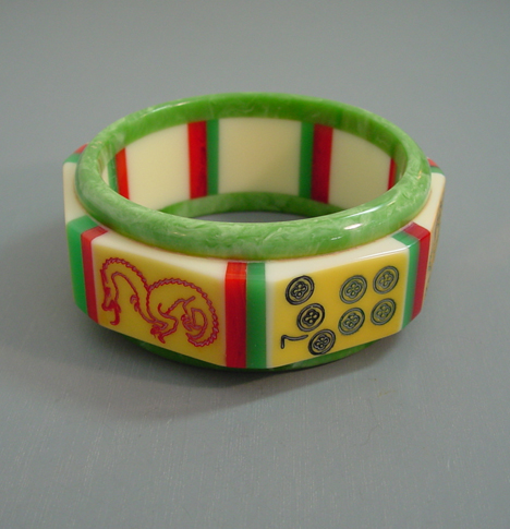 SHULTZ bakelite mah jong bangle with softly marbled green edges and green and red stripes