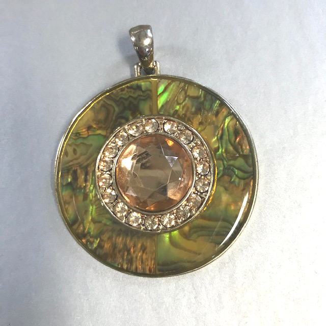 PENDANT lovely pendant with a abalone colored outer ring, center pale golden center rhinestone