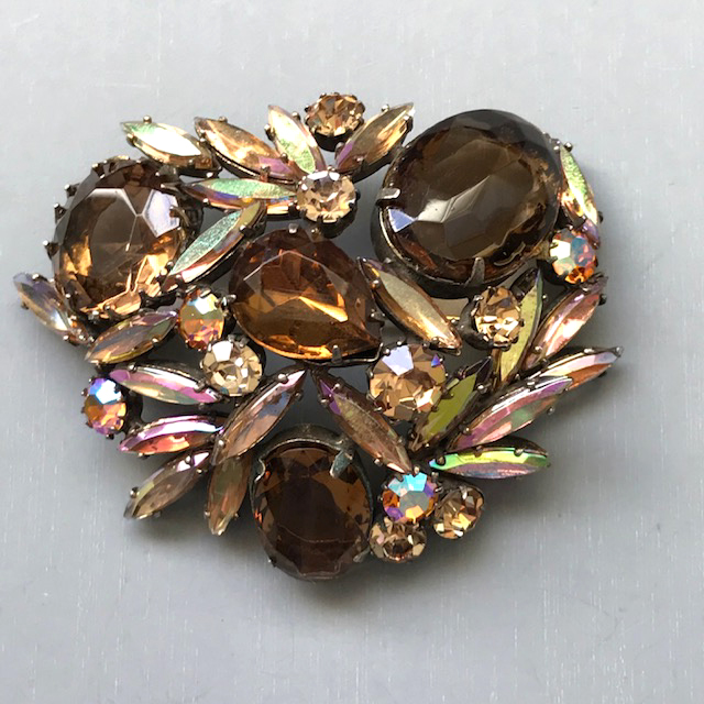 REGENCY domed brooch with big brown unfoiled rhinestones, long pastel marquise