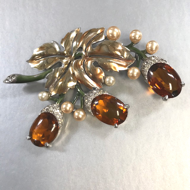 DUJAY attributed brooch with oval caramel colored unfoiled cabochons with facets on the back side only, glass pearls and clear rhinestone accents