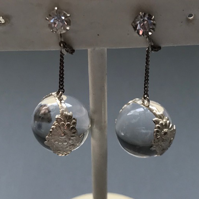 DECO era pools of light rock crystal ball dangling earrings with the silver flower surround