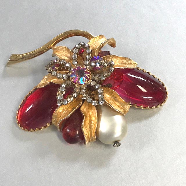 DEMARIO brooch with cherry red unfoiled oval cabochons, clear rose montee, a rose aurora borealis center