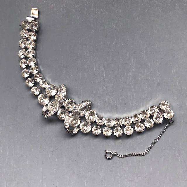 EISENBERG dazzling clear rhinestones bracelet in a silver colored rhodium plated setting, 1960s