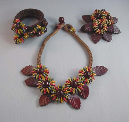 MIRIAM HASKELL Hess early unsigned wooden beads and leaves necklace, bracelet and brooch