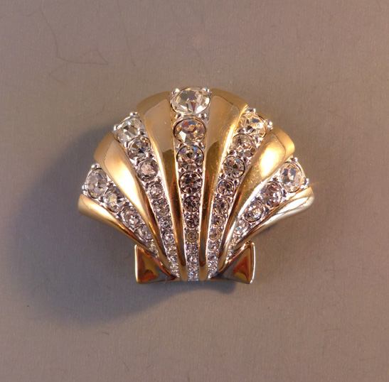 SWAROVSKI sea shell brooch with clear rhinestones in a hand polished gold plated setting