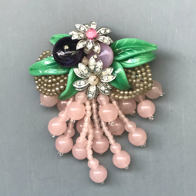 MIRIAM HASKELL by Frank Hess early unsigned pink and purple glass beads, artificial seed pearls and green glass leaves fur clip