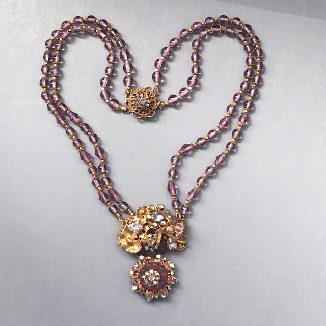 MIRIAM HASKELL re-worked lavender glass bead two-strand necklace with a pendant at the front made up of a glass flower, clear faceted glass beads