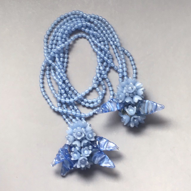 MIRIAM HASKELL by designer Frank Hess lariat necklace made of blue glass leaves, flowers and beads