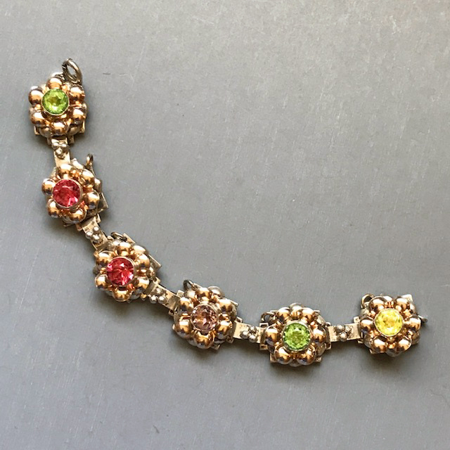 HOBE sterling silver, gold plated and rhinestone bracelet with pastel rhinestones in pink, yellow, green and lavender
